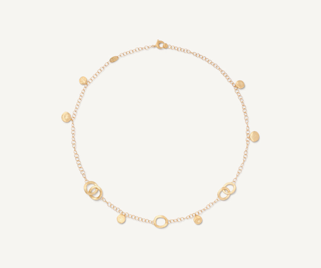 Short gold necklace with charms