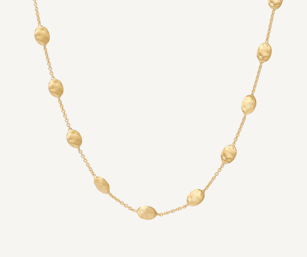 Gold necklace with mini oval elements